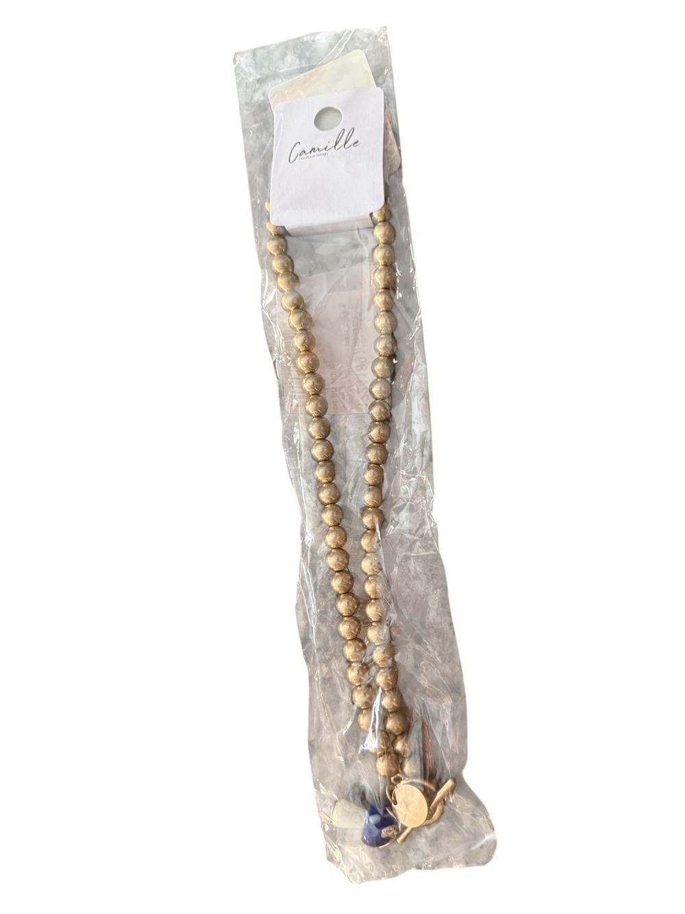 Gold Beaded Necklace with Blue mushroom and gold jewel charm